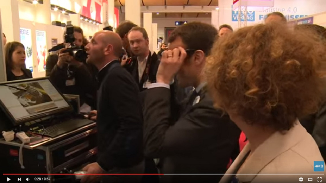 French Minister of Economy Emmanuel Macron experiencing IC IDO at Hannover Messe