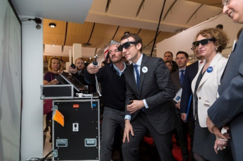 The French Minister of the Economy, Emmanuel Macron, accompanied by Muriel Pénicaud, Ambassador Delegate for International Investments, General Manager of Business France, experience the ESI IC.IDO Virtual Reality solution at the launch of the CREATIVE INDUSTRY campaign at the Hanover Fair on April 26, 2016.